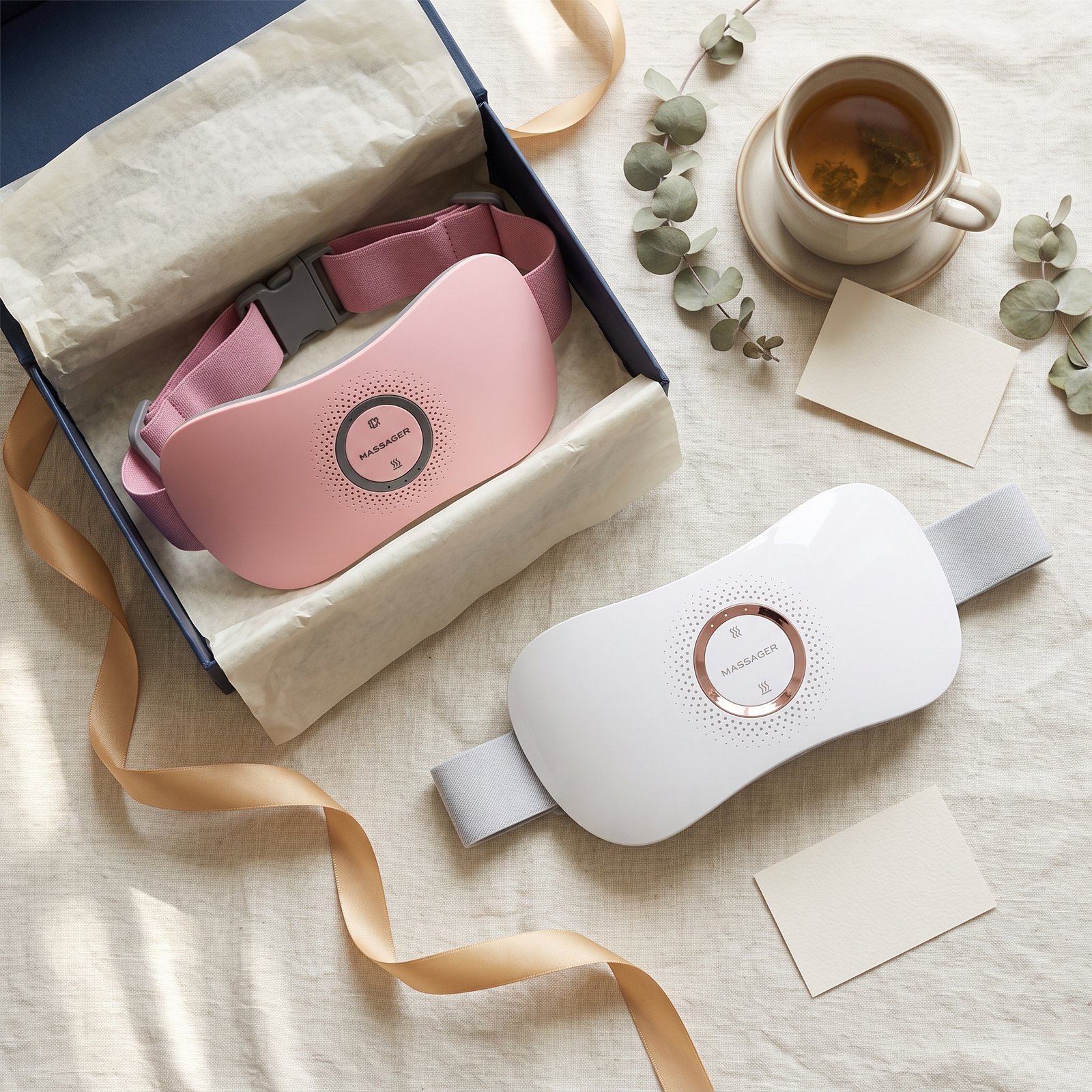 MONKIKA waist massagers in pink and white in a navy gift box